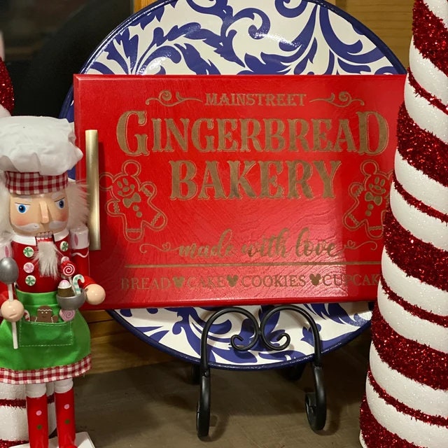 Red box labeled 'Mainstreet Gingerbread Bakery' with a decorative plate and gingerbread man figurine.