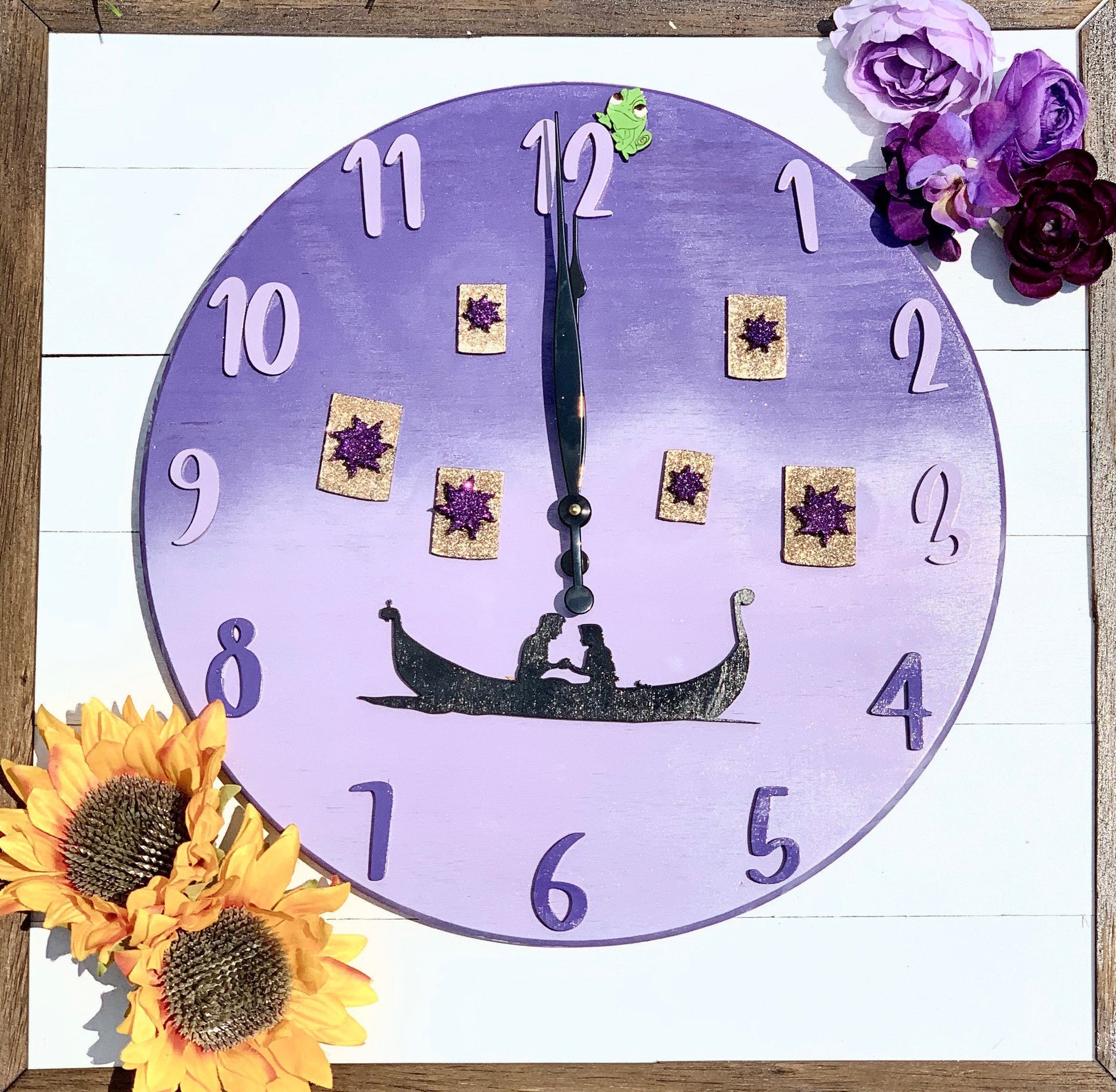 Decorative clock with floral elements on a wooden frame