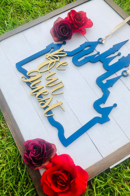Decorative sign with 'We will wait' text on a white background with red roses.